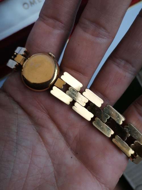 Working omega watch with original box. Valued at R35 000