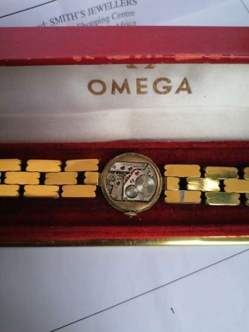 Working omega watch with original box. Valued at R35 000