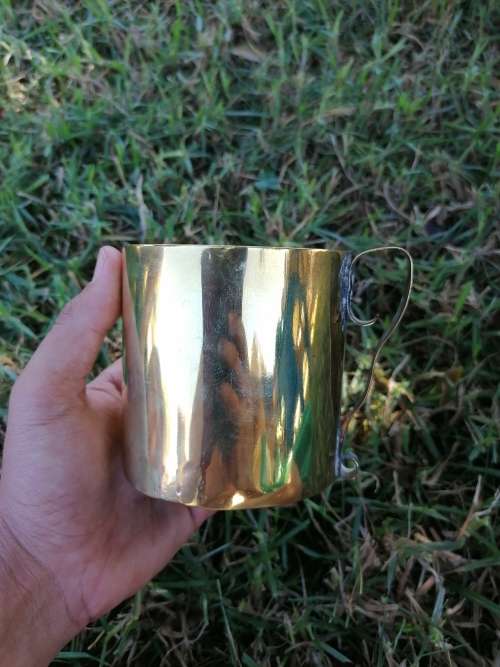 Old brass cup