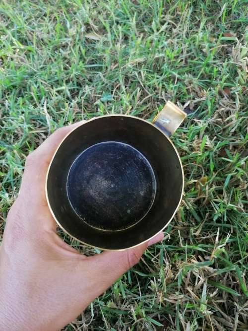 Old brass cup
