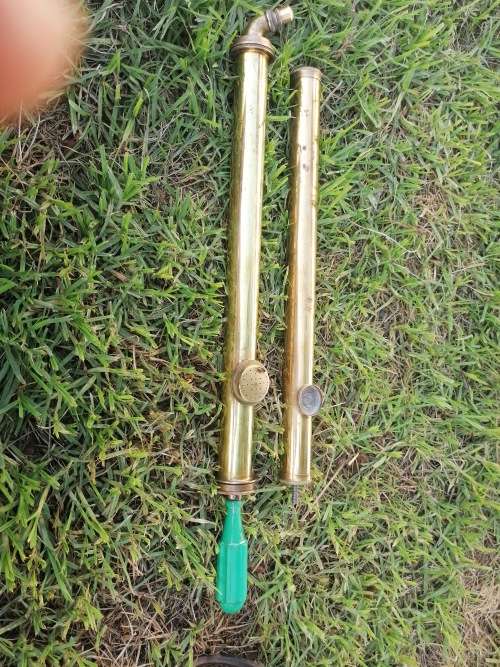 Two vintage brass sprays