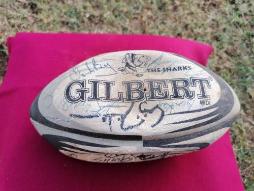 A VERY SCARCE MEDIUM RUGBY BALL WITH 17 SHARKS SIGNATURES -MAY BE SOME RARE !
