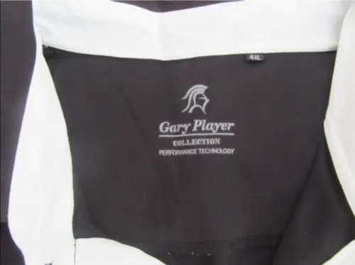 TWO GARY PLAYER BOOKS - ONE SIGNED - AND GOLF SHIRT