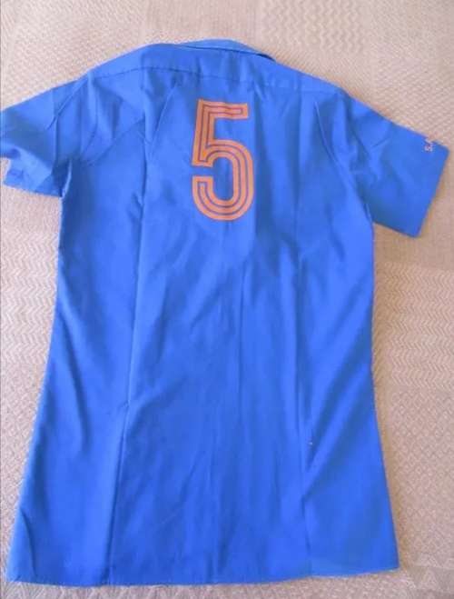 SHERYLLE CALDER`S UOVS MATCH WORN SHIRT AND T-SHIRT