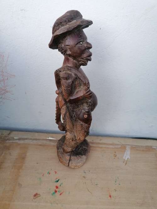 Heavily wood carving.48cm tall x 16cm
