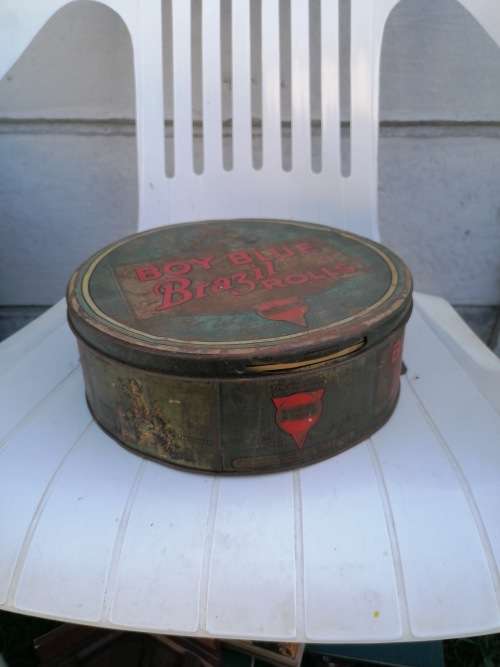 Vintage boy blue Brazil rolls tin