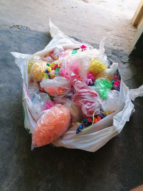 Bag full of children beads for making necklaces ect