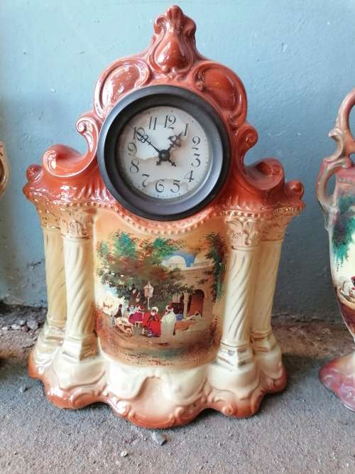 Wow stunning old porcelain Mantle set. Clock needs a service