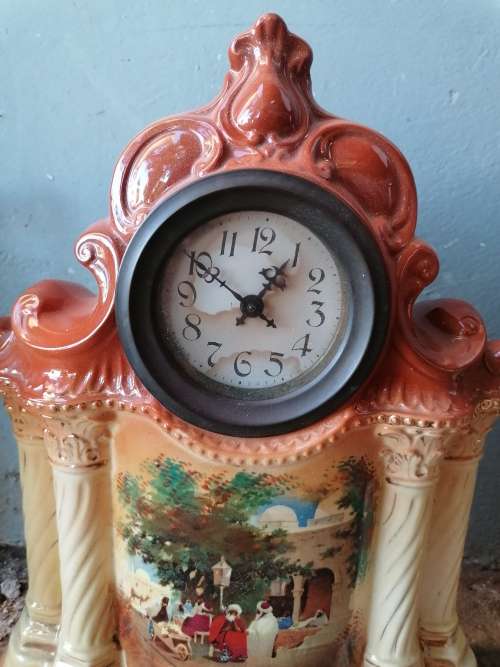 Wow stunning old porcelain Mantle set. Clock needs a service