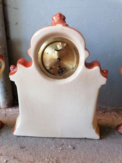Wow stunning old porcelain Mantle set. Clock needs a service