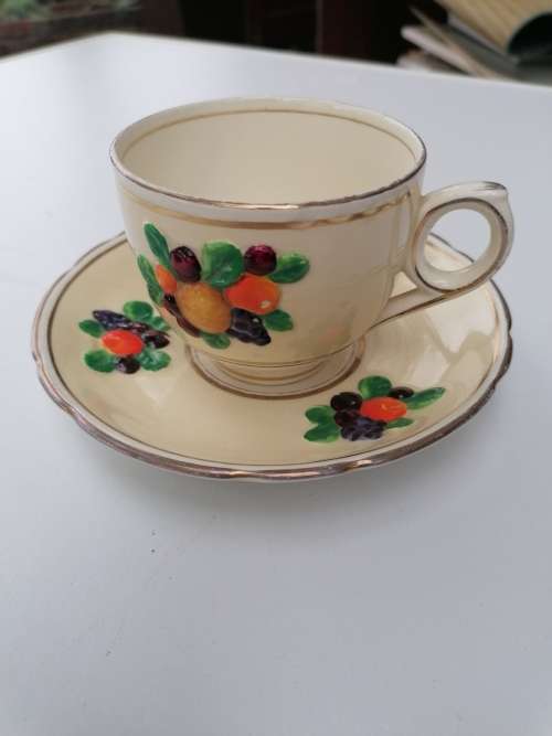 Antique Booths silicon China oeylon ivory cup and saucer