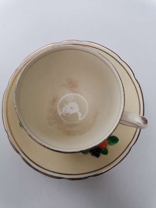 Antique Booths silicon China oeylon ivory cup and saucer