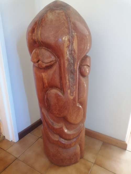 Large solid wood carving. Very heavy piece. Can collect it in Robertson western cape