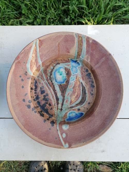 Lovely pottery plate by wendy