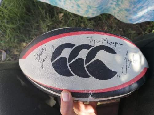 Two signed cheetah rugby balls
