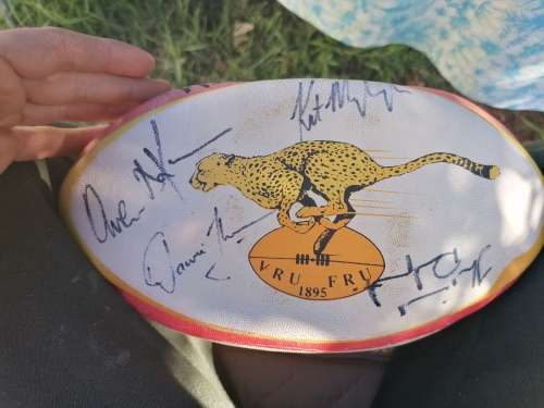 Two signed cheetah rugby balls