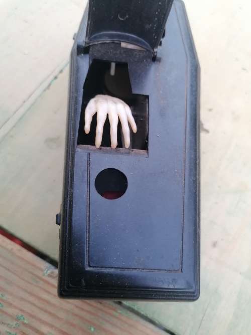 Working Wind Up Coffin Bank Skeleton Coin Grabber