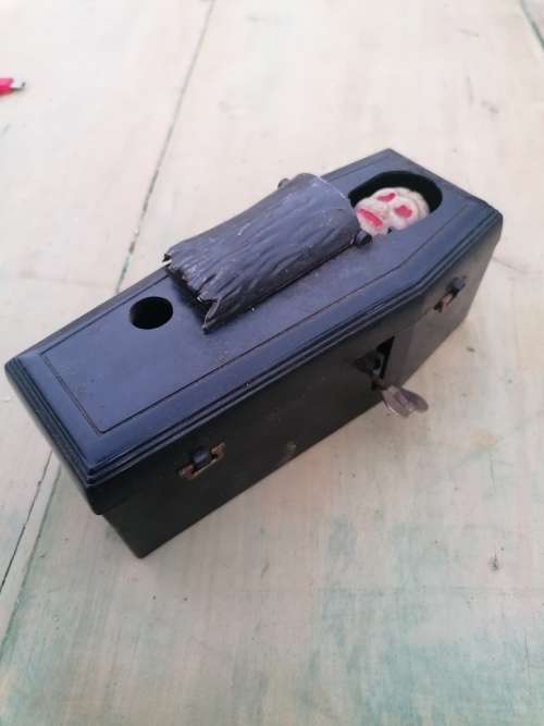 Working Wind Up Coffin Bank Skeleton Coin Grabber