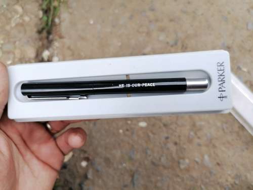 Parker pen. Needs ink. Marked `HE IS OUR PEACE