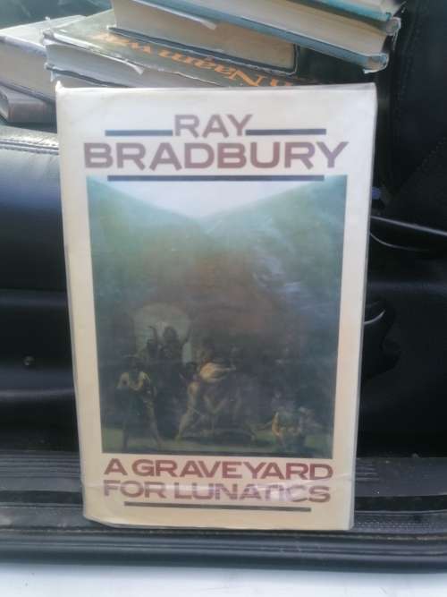 Ray Bradbury. A Graveyard for Lunatics. London: [1990