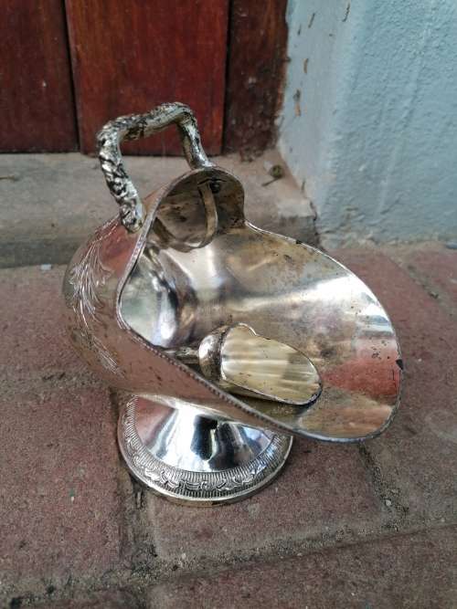 Vintage sugar scoop. Do have some tarnish