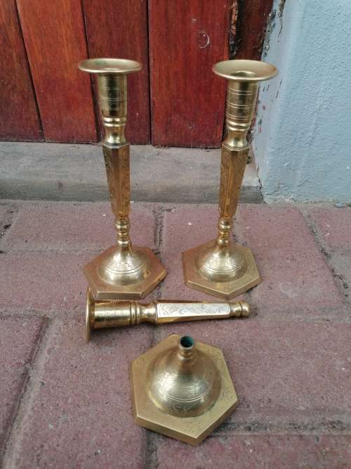 Vintage brass candle holders. One need repair