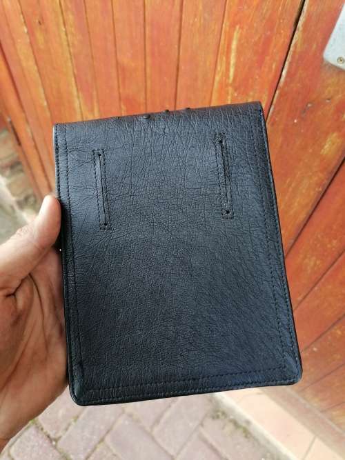 Looks like ostrich leather but not sure