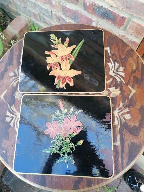 Very old coasters. Ssme pattern as Tiffany. Each have its own bag