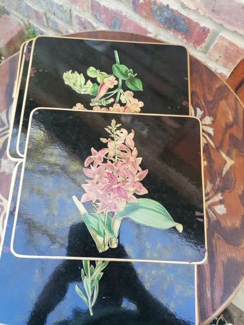Very old coasters. Ssme pattern as Tiffany. Each have its own bag