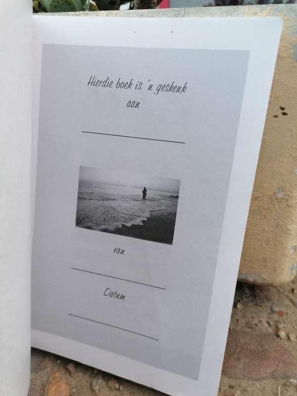 Man met balans n bybels dagboek