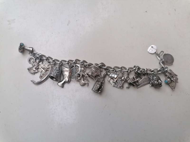 Wow stunning silver charms bracelet with 23 silver charms
