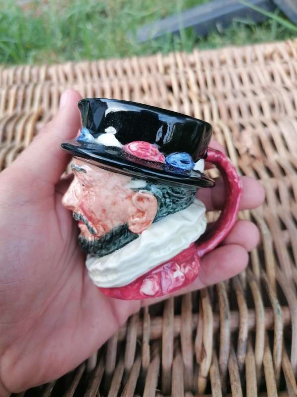 Royal Doulton Beefeater Toby Mug chipped at the base.