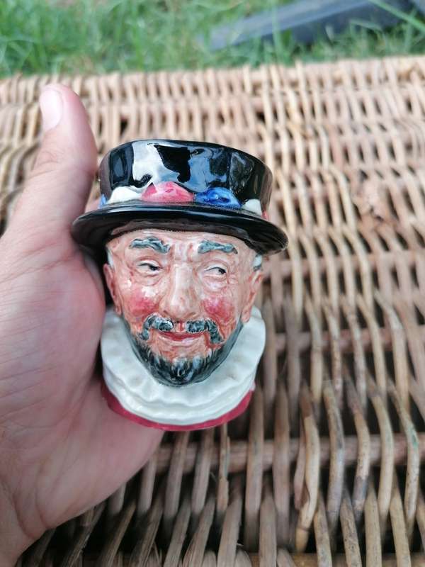 Royal Doulton Beefeater Toby Mug chipped at the base.
