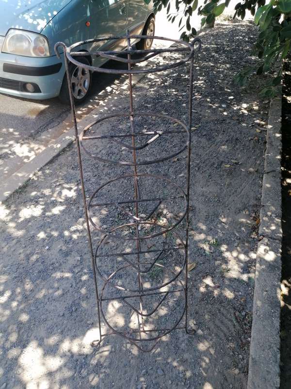 Vintage iron kitchen pot stand.