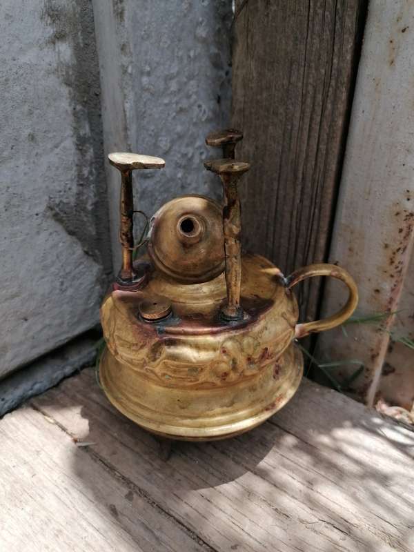 Small antique brass stove