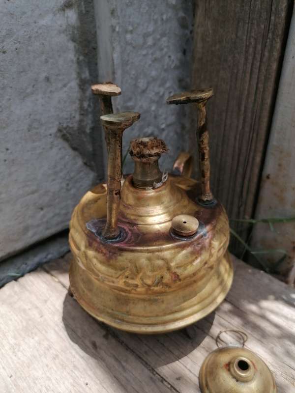 Small antique brass stove