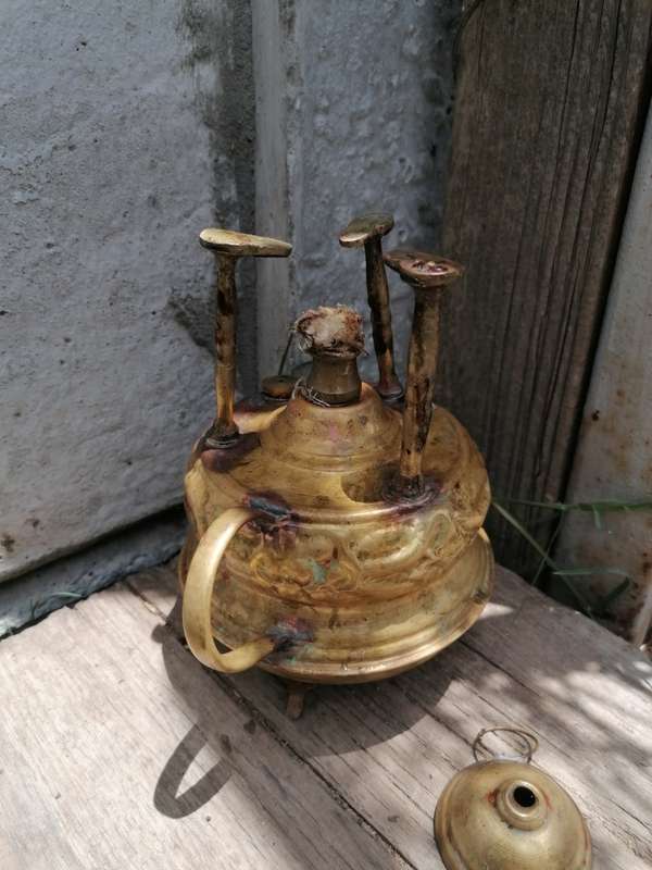 Small antique brass stove