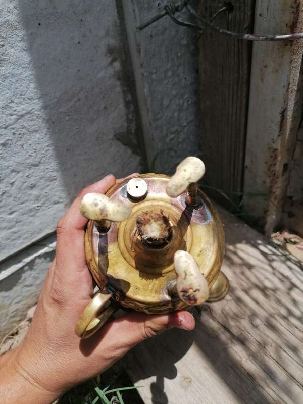 Small antique brass stove