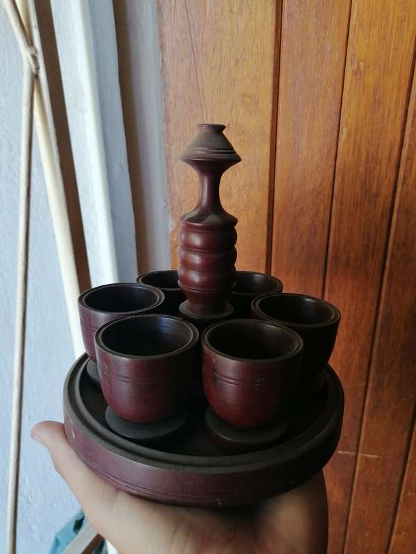 Antique stinkwood? with six egg cups