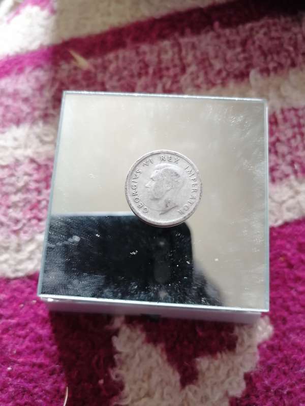 Silver south african 1942 6d.