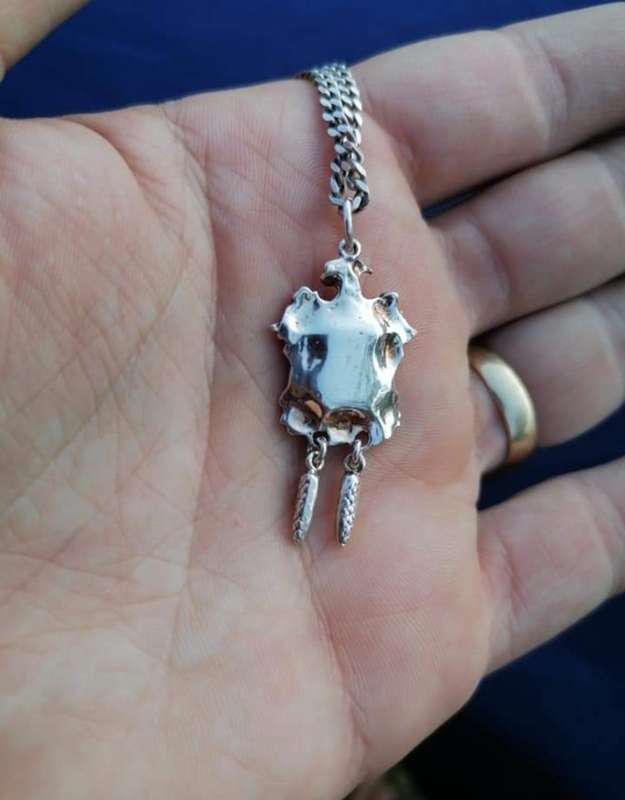 AN EXCEPTIONAL UNIQUE STERLING SILVER CUCKOO CLOCK PENDANT WITH A 73 CM STERLING SILVER NECKLACE