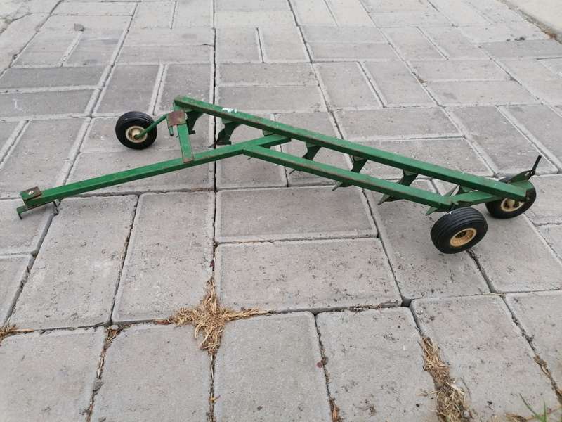 Vintage metal plow toy