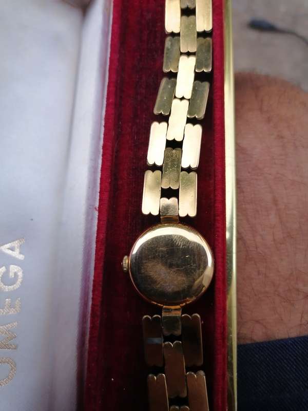 Working omega watch with original box. Valued at R35 000