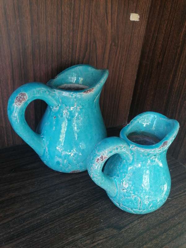 2 decor pitchers.