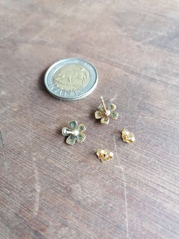 Vintage earrings. Back piece shows silver. Condition as per picture