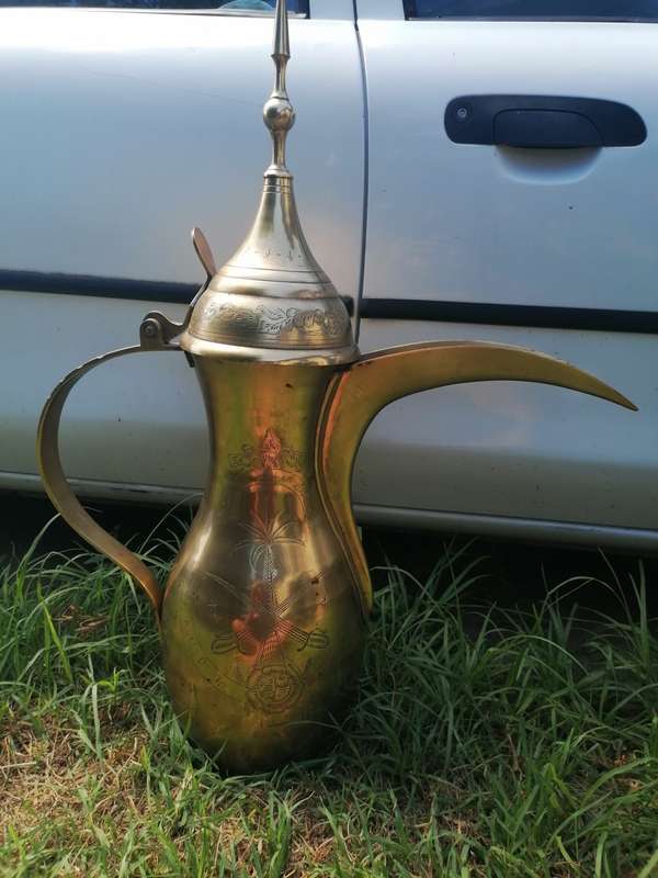 Large Saudi Arabia brass kettle. 79cm tall weight near 8kg