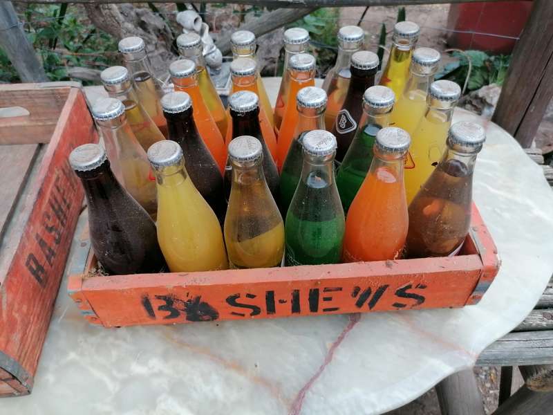 Vintage Bashews Crate with 24 original bottles 23 still have original content. Very rare
