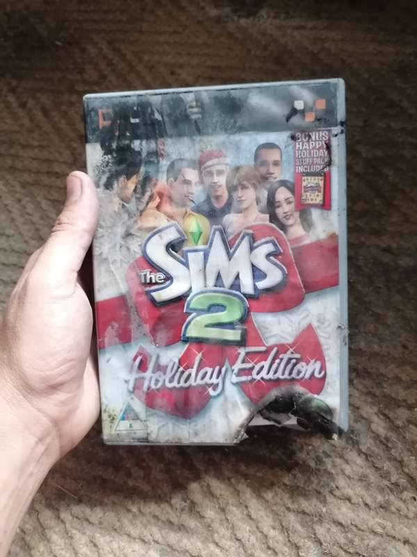 The sims 2 holiday edition + happy holiday expansion pack pc game