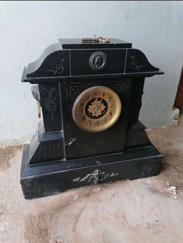 Rare Antique black marble mantle clock |