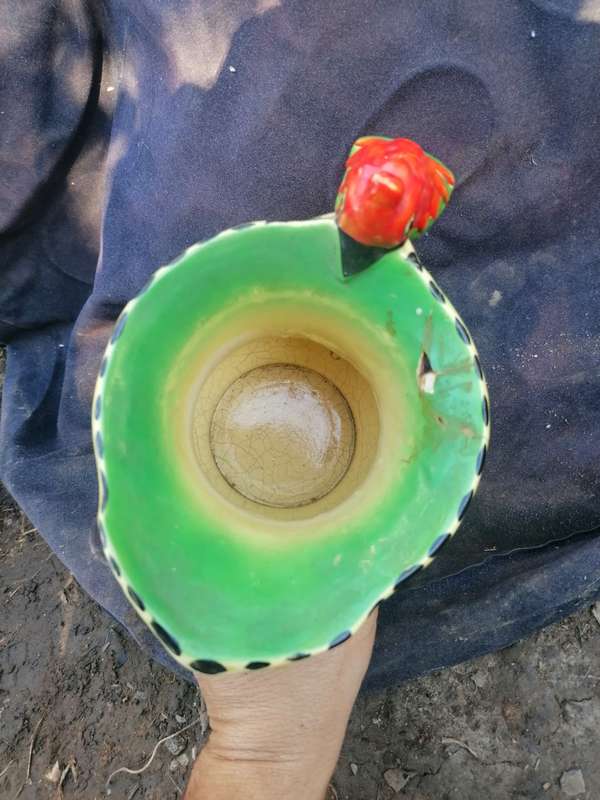 Vintage pitcher with repair